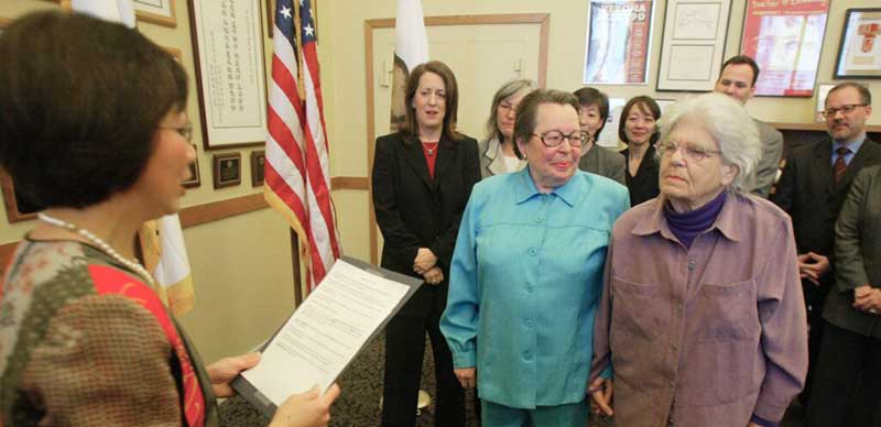 Del Martin and Phyllis Lyon are first lesbian couple to be married in California.