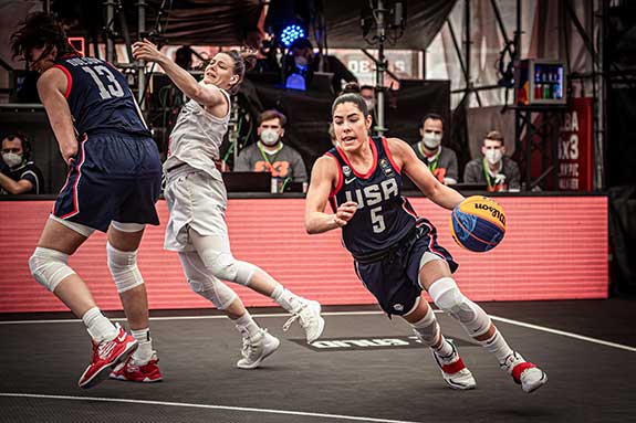 Photograph of Kelsey Plum driving during 3-on-3 event courtesy of FIBA