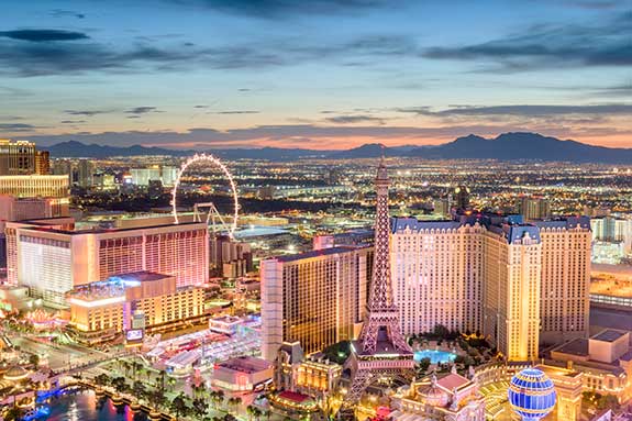 A magical view of the lights of the Las Vegas strip twinkle and glow in twilight of the setting sun.