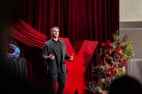 Connor-Fields-003 Photo of Connor Fields on stage at TEDxLasVegas by Midnight Creative Agency