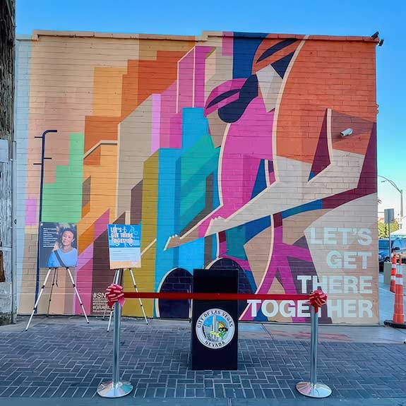 Brian-Alvarez-002 “Lets Get There Together” (2023) by artist Shan Michael Evans in collaboration with the Southern Nevada Bicycle Coalition, RTC, City of Las Vegas, Clark County Nevada, Psionic Art Works, Grafico LV, The Corner Building and the 18b Arts District Association. 1201 S. Main Street