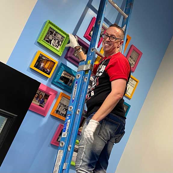 Brian-Alvarez-005 Brian “Paco” Alvarez installing photo at Freed’s Desert Shop in the 18b arts district, Downtown Las Vegas.