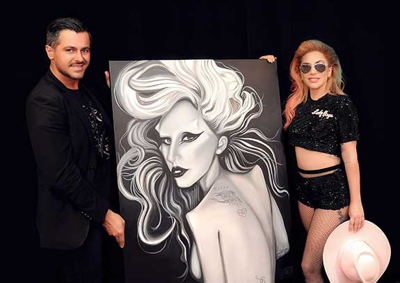 Lady Gaga poses for a photo with Nick San Pedro, after signing another of the artist’s original paintings. Photo by Yvonne Gougelet. “Born This Way II” (2011), Acrylic on Canvas, 36” x 48” by Nick San Pedro