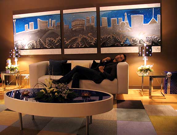 Nick San Pedro with his original custom triptych canvas paintings for Jerry Seinfeld’s Colosseum green room at Caesar’s Palace. Photo by Mishaye King. “Hanukkah in Vegas” (2005), 48” x 156” Triptych Acrylic on Canvas by Nick San Pedro.